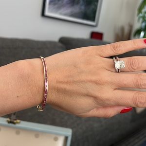 Rose gold bangle with pink sapphires
